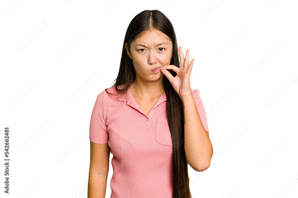 Young Asian woman isolated with fingers on lips keeping a secret. Young Asian woman isolated with fingers on lips keeping a secret.