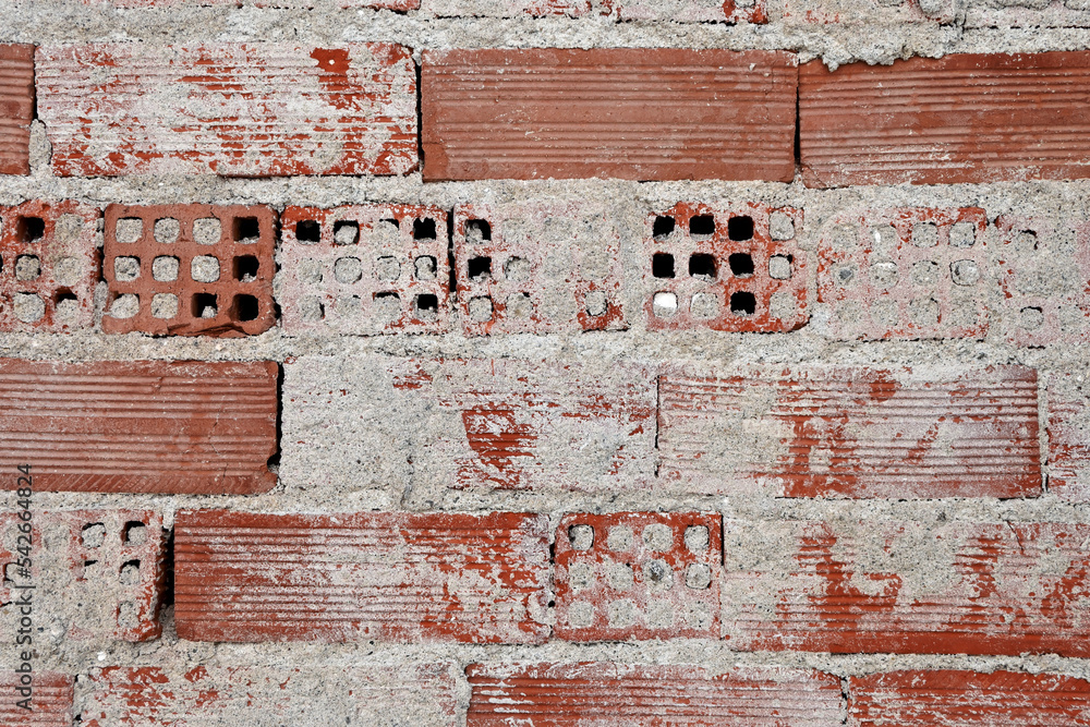 brick wall with remaing plaster
