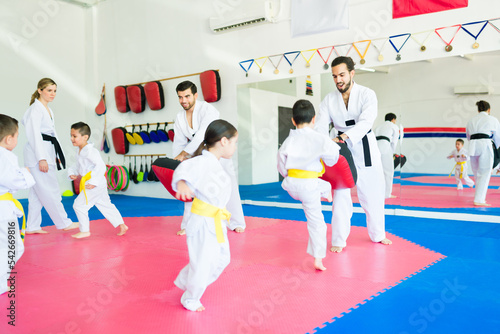 Toddlers exercising with karate