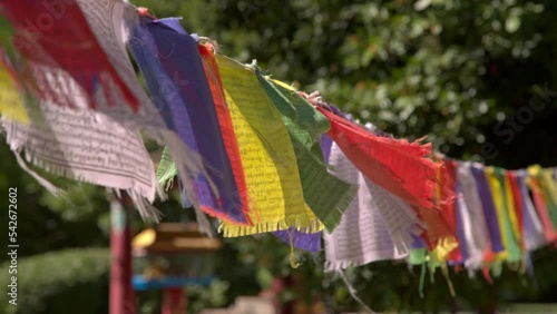 closeup view Prayer Flags in Lama Tzong Khalpa Institute in Pomaia, Tuscany, Italy
 photo
