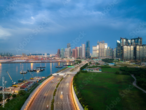 Aerial view of Singapore business district and city at twilight in Singapore, Asia © ake1150