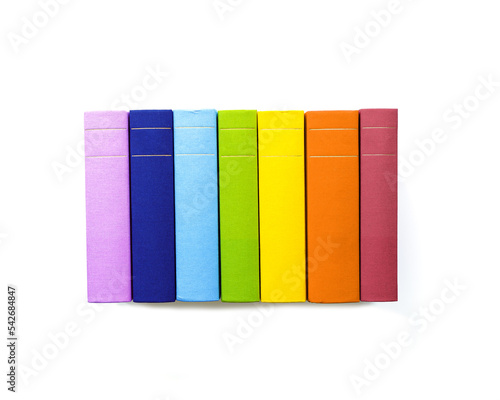 Multicolors books minimal pattern with bright colorful cover, handback books, Top view mockup for library, education theme. Read paper book and study concept. Isolated on white background photo