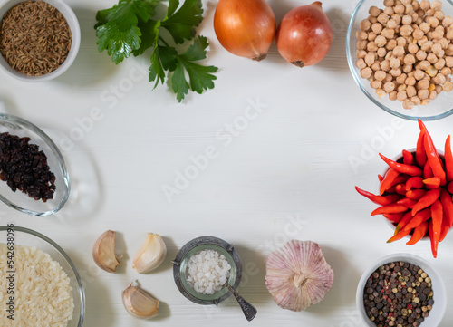 Ingredients for vegan pilaf with chickpeas on a white background