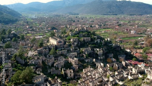 Kayakoy Abandoned ghost town, stone houses and ruins. The site of the 18th century Ancient Greek city of Karmilissos. Fethiye - TURKEY photo