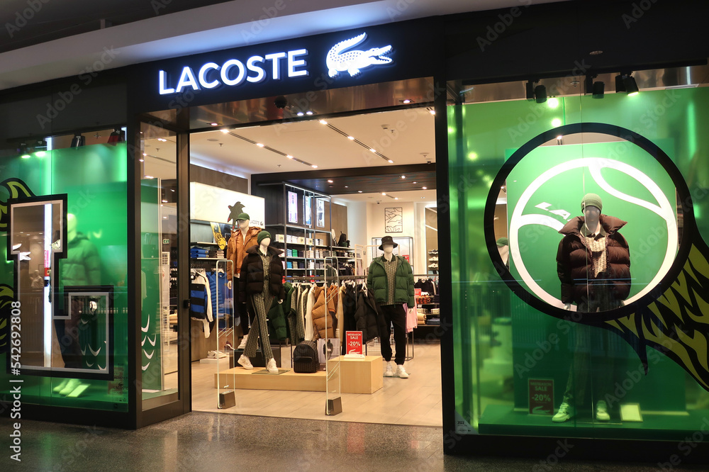 Overeenstemming shit jaloezie Lacoste clothing retail store in Artium Reduta shopping mall. WARSAW,  POLAND - OCTOBER 26, 2022 Stock Photo | Adobe Stock