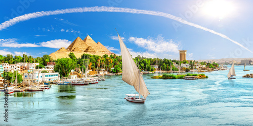Aswan city in Egypt, view of the Nile and sailboats