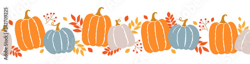 Seamless border of colorful pumpkins, autumn leaves and berries. Template for cozy autumn design. 