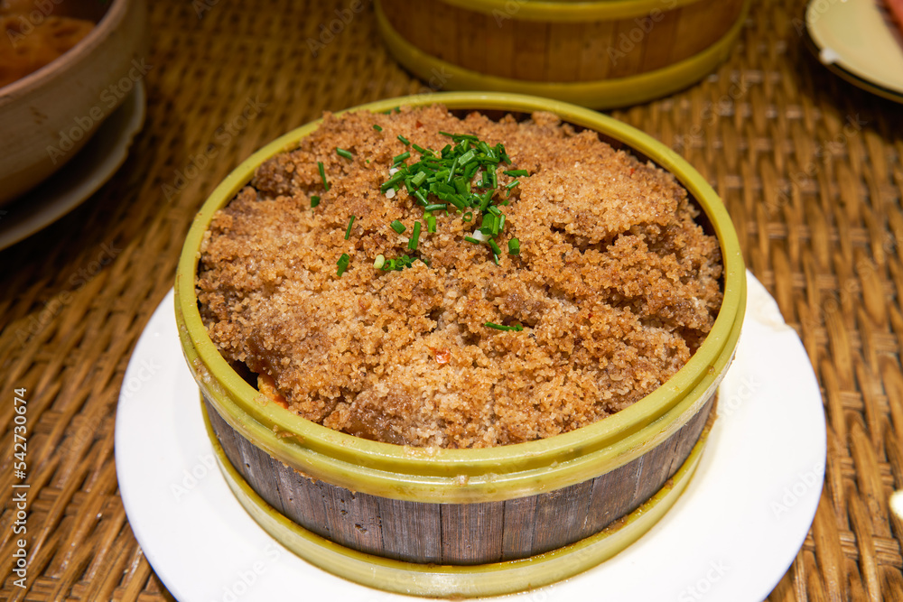 A delicious traditional Guilin dish, steamed pork with rice powder A delicious traditional Guilin dish, steamed pork with rice powder