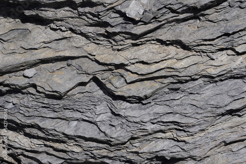 Layers of rock caught as close up view. Sedimentary rock known as flysch with abundant occurrence in the alps. It is suitable as background.  photo