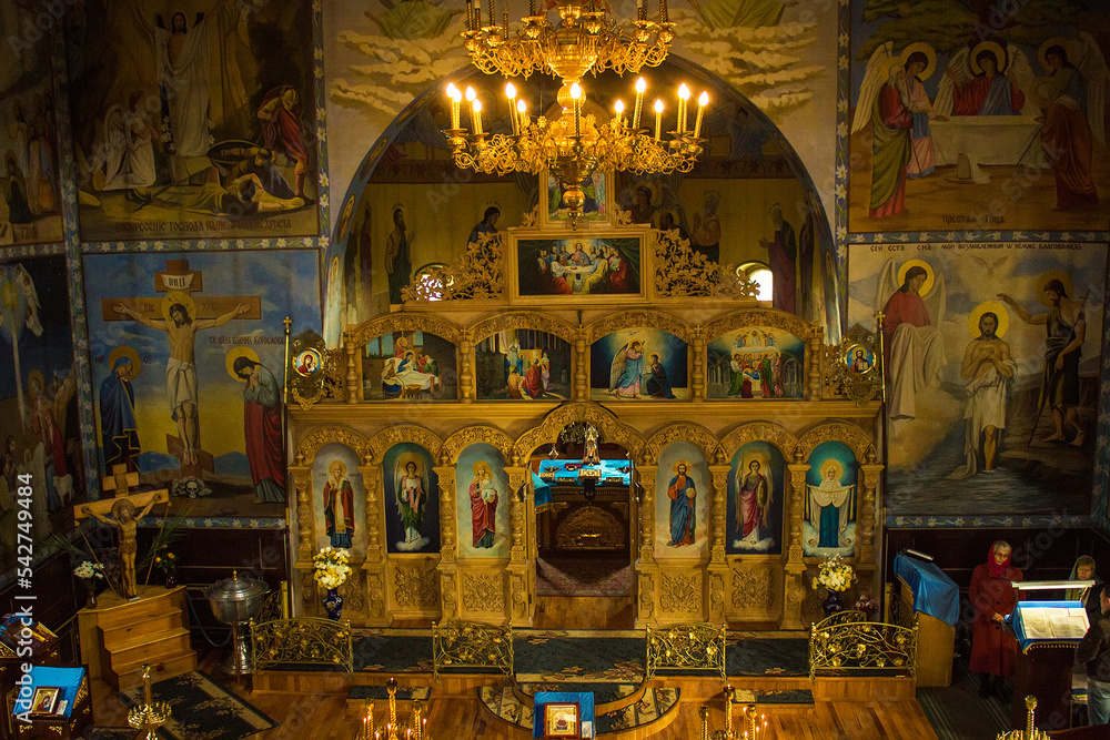 Obraz premium Interior of Ukrainian orthodox church in Svitlovodsk, Kirovograd region, Ukraine. Altar, icons and other church utensils. Soft focus