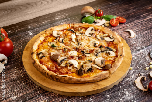 Pizza funghi with tomato sauce, mozzarella and fresh mushrooms
