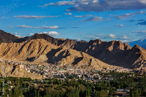 View of Leh from above from Shanti Stupa on sunset in Himalayas. Ladakh, Jammu and Kashmir, India