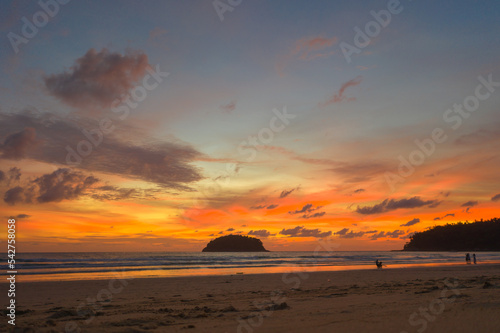 aerial view sweet sky in sunset above the ocean at Kata beach Phuket. .abstract nature background..Sunset with sweet color light rays and other atmospheric effects.