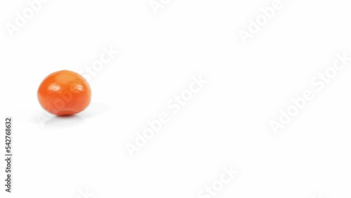 rolling orange fruit on the white background, citrus on the white slow motion,  Fresh orange moving on a white background,  photo