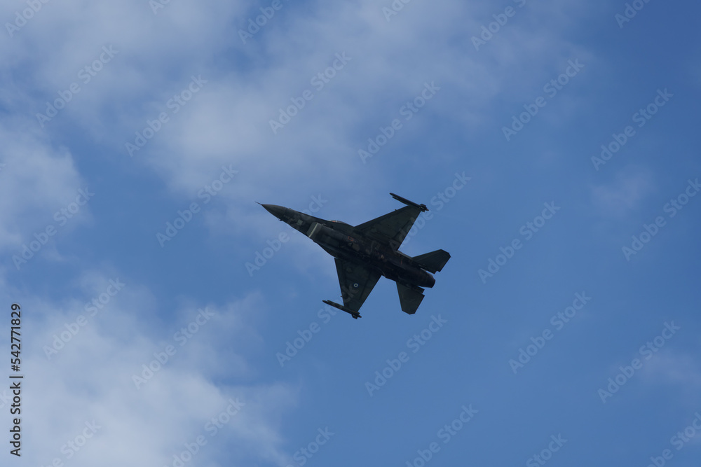 F-16C Block 52 plus fighter demonstrating flight air show. HAF Hellenic Air Force Jet of team Zeus above Thessaloniki, Greece during the 28 October National Oxi Day parade. F-16C Block 52 plus fighter demonstrating flight air show. HAF Hellenic Air Force Jet of team Zeus above Thessaloniki, Greece during the 28 October National Oxi Day parade.