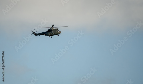 Fototapeta Naklejka Na Ścianę i Meble -  Helicopter on a training exercise, autumn sky, Wiltshire UK