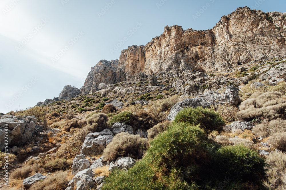 Hiking trail in a beautiful gorge for active walks in Greece on the island of Crete
