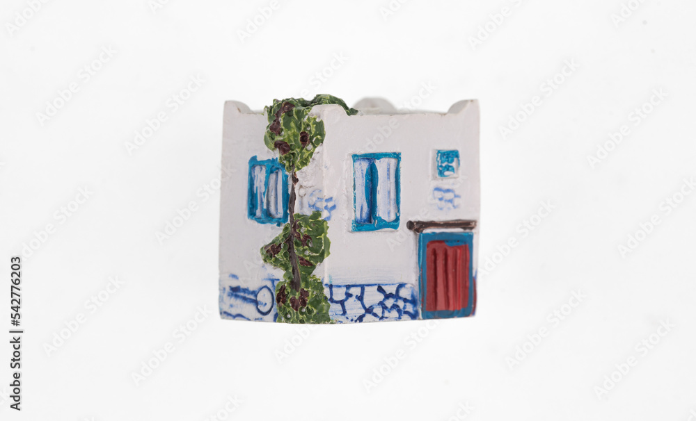 Fototapeta premium Greek house toy isolated on white background