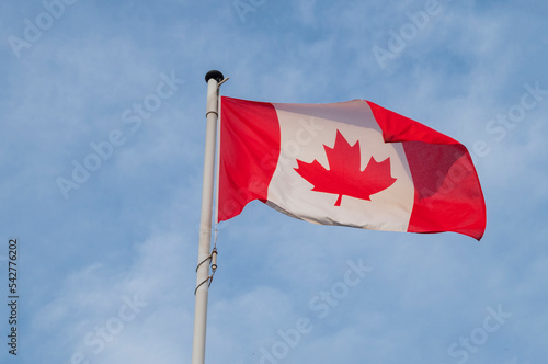 flag state canada north america flying against the sky