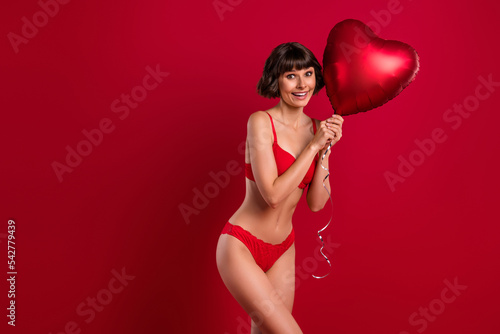 Photo of pretty surprise stylish trendy lady hold heart air balloon 14 february offers isolated vivid bright color background
