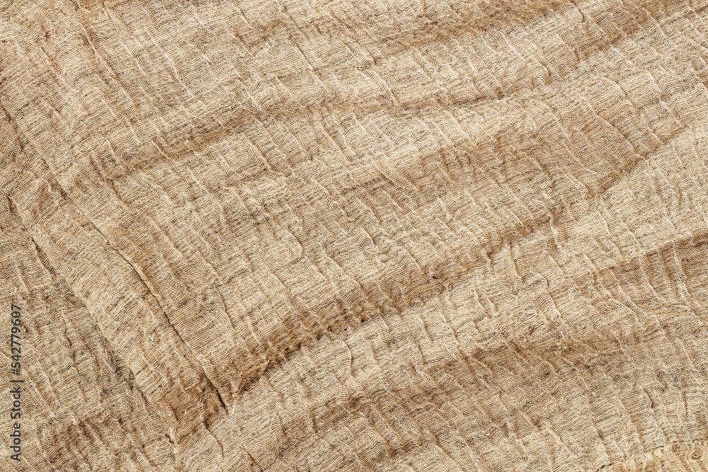 Fototapeta premium Wrinkled sackcloth burlap. Close-up of texture. Vintage background
