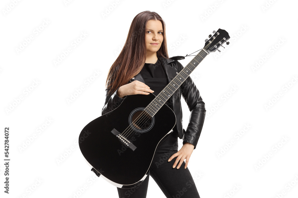 Female musician with an acoustic guitar posing Female musician with an acoustic guitar posing