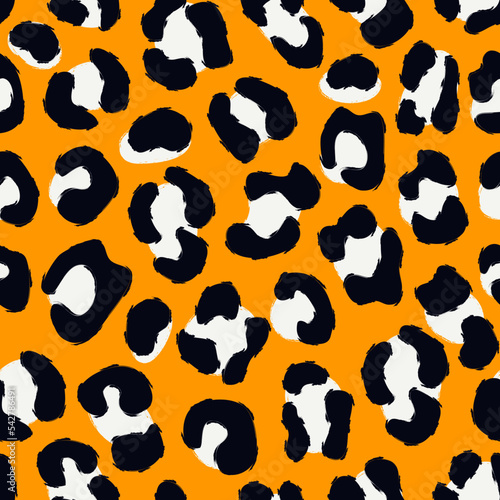 Animal skin print. Leopard seamless pattern. Natural wildlife camouflage texture. Repeating spots motif. Hand drawn background
