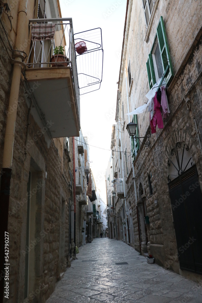 Narrow old alley in Trani, Italy