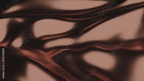 Close up shot of morphing bronze colored liquid metal. 3D animation or motion design photo