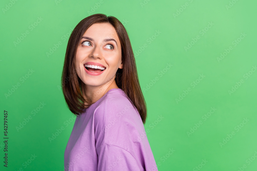 Photo of lovely lady with shiny hollywood smile look empty space dental care banner isolated on green color background Photo of lovely lady with shiny hollywood smile look empty space dental care banner isolated on green color background