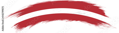 Flag of Latvia in rounded grunge brush stroke.