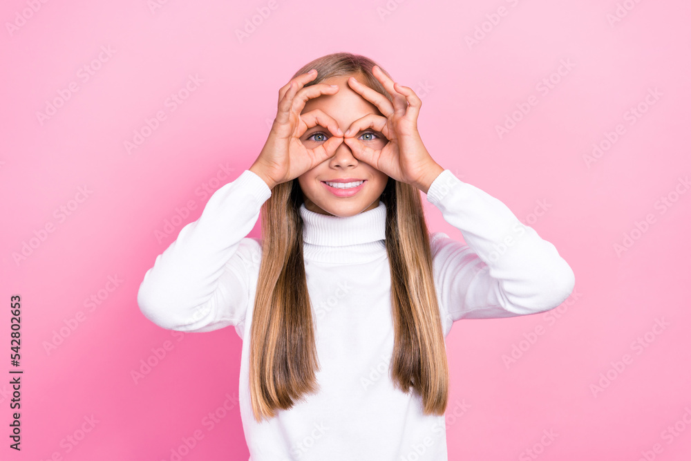 Portrait of attractive cheerful girl wear white outfit arm demonstrate imaginary eyewear good mood isolated on pink color background Portrait of attractive cheerful girl wear white outfit arm demonstrate imaginary eyewear good mood isolated on pink color background