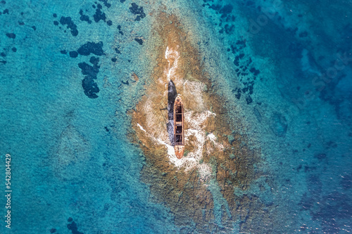 MV Demetrios II cargo ship wrecks on the coral riffs among the sea waves, Paphos, Cyprus photo