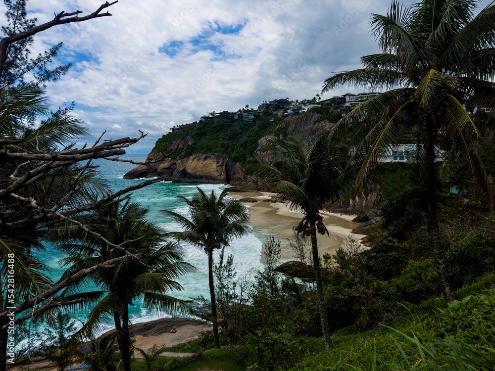 View of Joatinga Beach, Rio de Janeiro, Brazil. Day with blue sky and some clouds View of Joatinga Beach, Rio de Janeiro, Brazil. Day with blue sky and some clouds