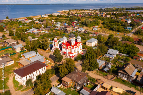 Summer view from drone of small Russian town of Kozmodemyansk in Mari El Republic on banks 