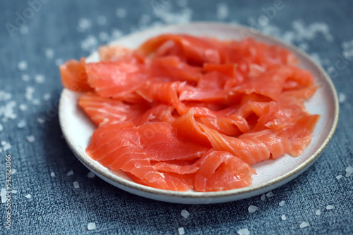 Close-up. Salted salmon fillet on a plate.