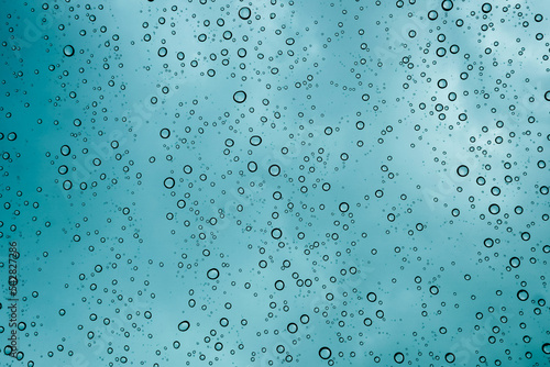 Drops of water on the windshield of the car in heavy rain. water drop backgrond.