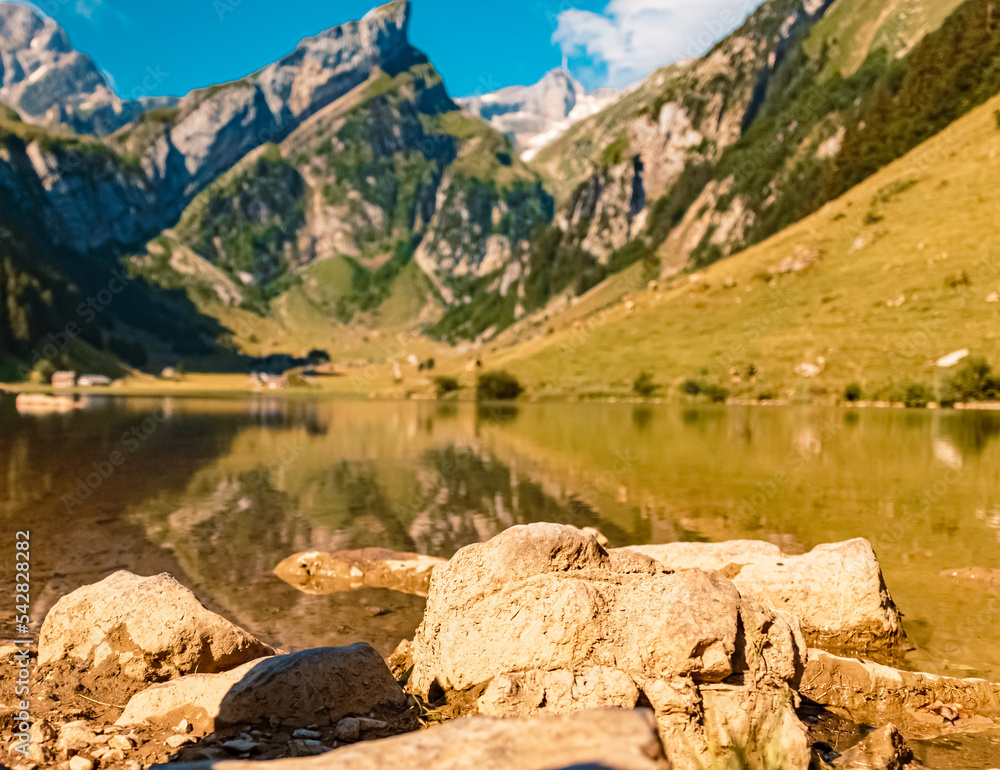 The Saentis summit in the background with reflections at the famous Seealpsee lake, Innerrhoden, Appenzell, Alpstein, Switzerland