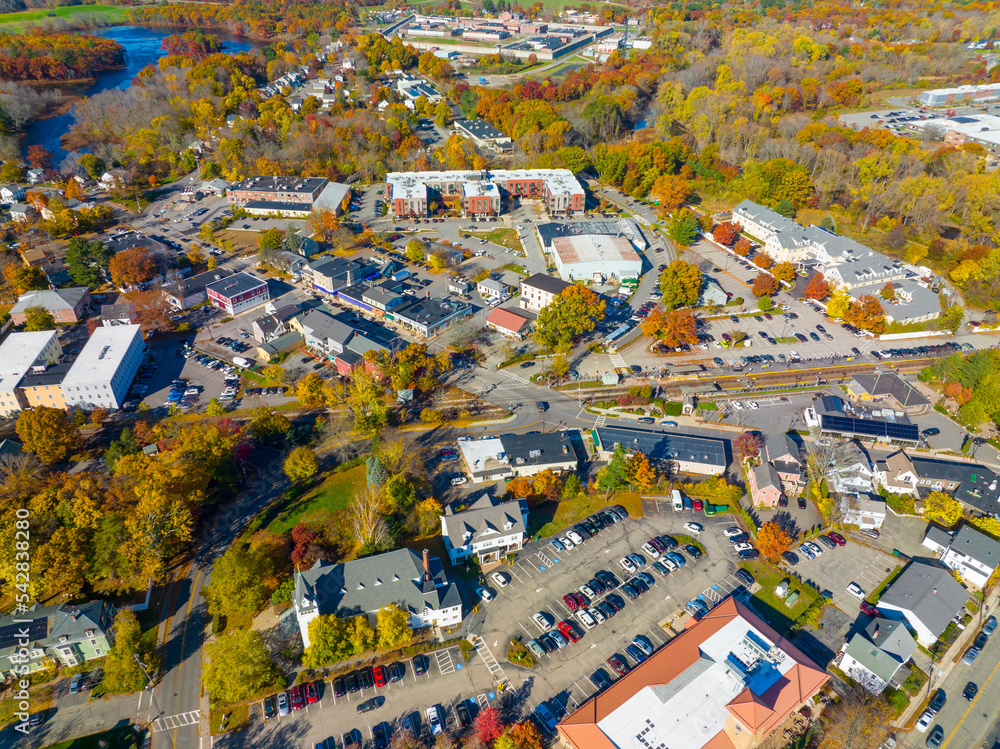 West Concord village center aerial view on Commonwealth Avenue and Railroad in fall in town of Concord, Massachusetts MA, USA. 