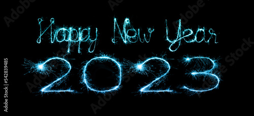 2023 happy new year fireworks celebration written sparkling at night.