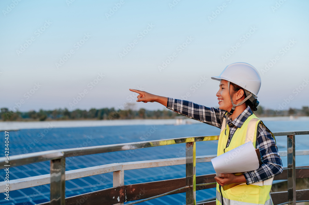 Young inspecotor female checking operation photovoltaic solar panel
