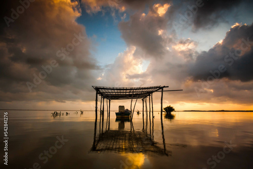 Long Boat near the beach of Tumpat Kelantan, moment during sunrise.