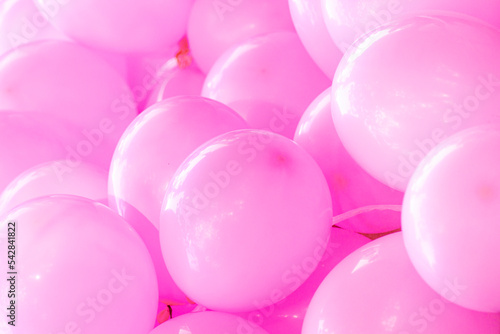 Blurred image, pink balloons stacked on top of each other. image for background