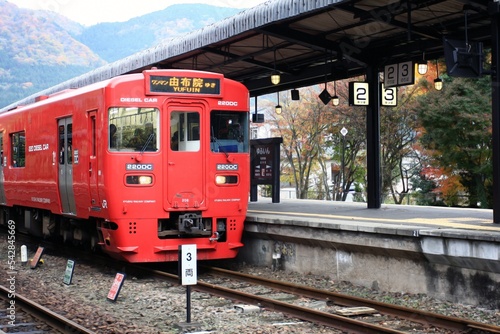 Yufuin, Oita, Japan:  Japanese local train at a platform in Yufuin Train station