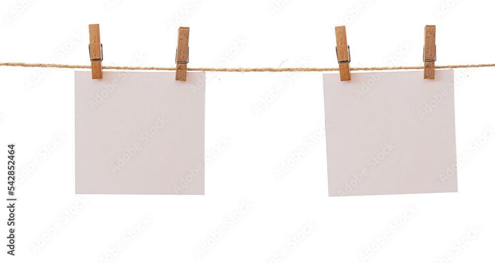 Two frames that hang on a rope with clothespins and isolated on white. Blank cards on rope mockup template Two frames that hang on a rope with clothespins and isolated on white. Blank cards on rope mockup template