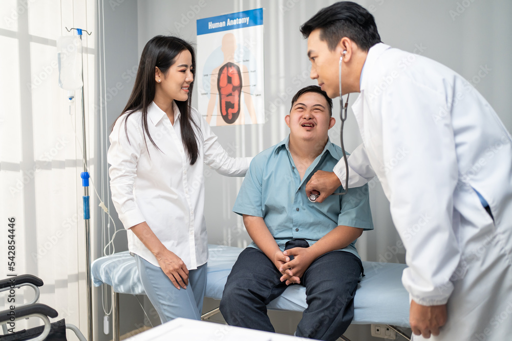 Asian young man and mother visit and consult health problem with doctor. Asian young man and mother visit and consult health problem with doctor.