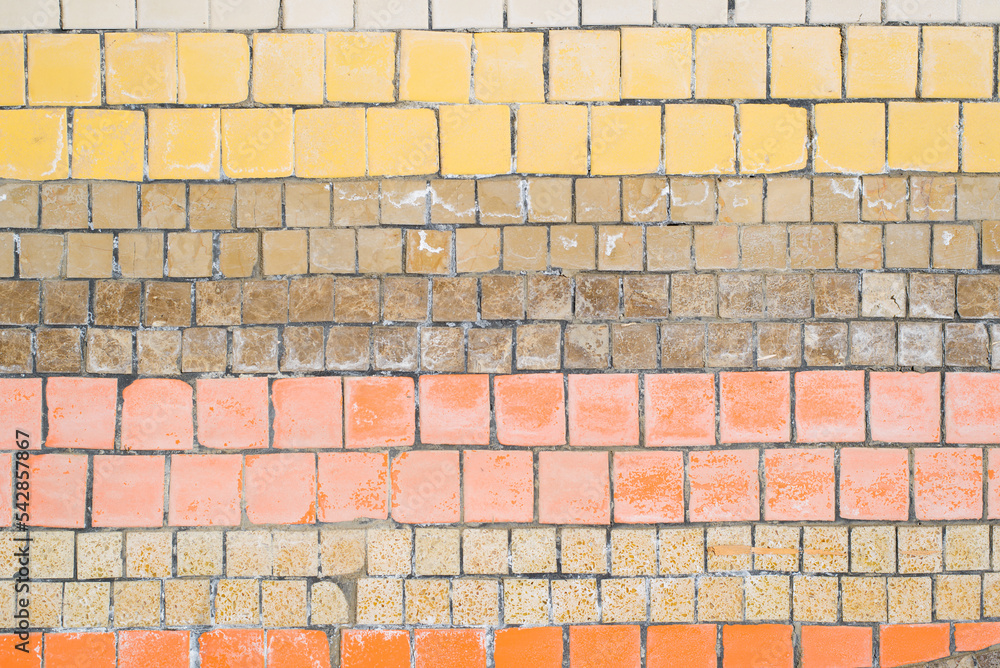 Obraz premium Old mosaic horizontal striped pattern, shabby small ceramic colorful decorative tiles