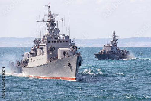 Leinwand Poster Military navy ships in sea war battle.