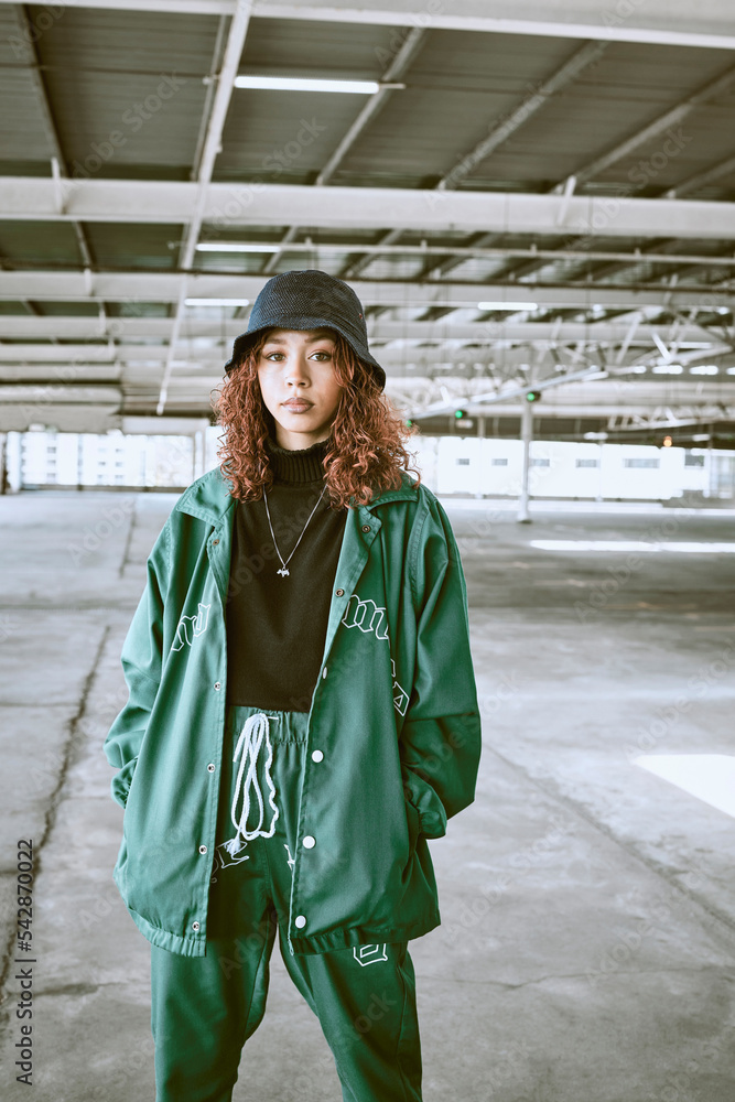 Portrait fashion and woman with street clothes in the city for