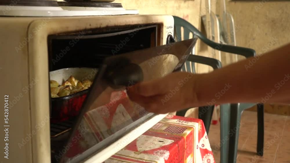 Nutritious Potatoes In Baking Tray Being Cooked In Convection Oven
